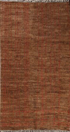 a brown rug with red lines on it