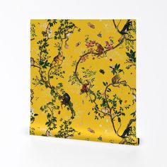 a yellow wallpaper with birds and flowers on it's side, in front of a white background