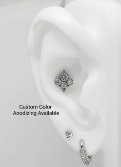 "This Large Gem and Bead Cluster Labret is a show stopper! It is very high quality, made of ASTM F136 Titanium, 16 guage, internally threaded, and Absolutely Gorgeous! It is 10mm long, and about 8mm wide. Right now I have 6,8, and 10mm Labret lengths available. If the length you need is sold out, or if you need a different length, please message me and I'll see if I have an extra post for you, or I will message you when I have more labret length options! Custom Anodizing Available Please message Conch Hoop, Anodized Titanium, Cartilage Jewelry, Conch Earring, Piercing Shop, Titanium Jewelry, Conch Piercing, Screw Back Earrings, Tragus