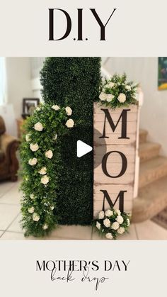 a mother's day sign with flowers on it and the words diy above it