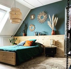 a bed room with a neatly made bed and lots of plants on the wall above it