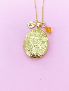 This is a brass locket charm with hand-stamped initial and birthstone charm on 18 inches chain.  I do not put the photo to the locket ♥ You will receive ONE necklace. HOW TO ORDER 1) Choose the quantity. 2) Choose the initial and birthstone in the option or add a note to seller at checkout. 3) Add to the cart. DESCRIPTION ♥ Necklace, Real 18K Gold Plated Brass Cable Chain Necklaces Making, with Lobster Claw Clasp, Size: about 17.51 inch(44.5cm) long (excluding chain extender) ♥ Initial Charms St Personalized Gold Birthstone Necklace As Gift, Personalized Gold Birthstone Necklace For Gift, Personalized Gold Birthstone Necklace As A Gift, Vintage Engraved Charm Necklaces For Keepsake, Gold Pendant Locket Necklace With Birthstone, Vintage Engraved Charm Necklaces As Keepsakes, Personalized Gold Birthstone Necklace For Mom, Gold Charms Locket Necklace Keepsake, Mother's Day Locket Necklace With Charms