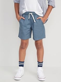 Elasticized waistband, with functional drawstring.  Faux fly.  On-seam pockets.  Single welt pocket at back right.  Soft 100% cotton twill.  Easy pull-on style.  #562211 Sits at waist.  Straight through hip and thigh.  Shortest inseam; boys jogger sh Casual Shorts With Elastic Waistband, Casual Shorts With Drawstring And Adjustable Waist, Casual Solid Color Pull-on Shorts, Casual Pull-on Style Shorts, Sporty Bottoms With Pockets And Adjustable Waist, Casual Shorts With Adjustable Waist, Casual Pants With Elastic Waistband And Short Length, Casual Shorts With Pockets And Adjustable Waist, Casual Bottoms With Adjustable Comfort Waistband