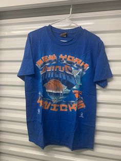 Vintage 90's New York Knicks Nutmeg T-Shirt Men's Medium 90s Crew Neck T-shirt For Fan Gear, 90s Style T-shirt For Fan Gear With Crew Neck, 90s Graphic Print T-shirt For Fan Gear, 90s Style Crew Neck T-shirt For Fan Gear, 90s Style Graphic Print T-shirt For Fans, 90s Style Crew Neck T-shirt For Sports Events, Basketball Streetwear, 90s New York, Knicks Basketball