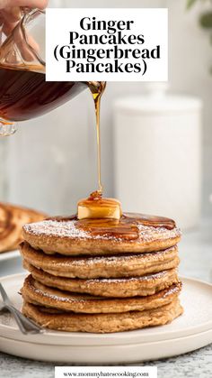 a stack of pancakes with syrup being drizzled on top