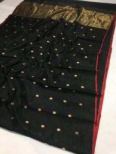 It's a beautiful Original chanderi handloom pure pattu soft silk saree . All over minakari teeli work jaal handmade nakshi border including running plane blouse. Saree length: 6.40m, width: 46in  [ saree 5.50m, blouse 90cm ] Dry clean only . Please note - color may be vary a little due to sunlight and photography . Please message us after purchasing in case you want fall and Pico done it not . No extra charges for fall and Pico but inform us . Blouse stitching is also available . Black Slub Silk Saree With Cutdana, Black Slub Silk Saree, Black Paithani Silk Saree With Self Design, Festive Black Slub Silk Saree, Black Cotton Silk Saree For Diwali, Black Slub Silk Dupatta With Self Design, Black Cotton Silk Dupatta For Diwali, Bollywood Style Black Cotton Silk Saree, Black Cotton Silk Saree With Cutdana