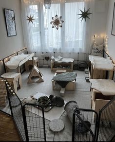 a living room filled with lots of furniture and decor on top of carpeted floors