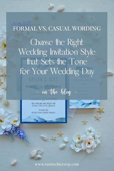 the wedding stationery is surrounded by flowers and seashells