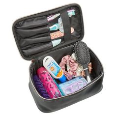 Keep your cosmetics and accessories organized and ready to go at a moment's notice with this Black Cosmetic Train Case. This attractive case is the perfect traveling size and features a single two-way bronze zipper on a wide opening, an elastic strap to keep your brushes secure in the lid, and an easy-carry handle on top. The large, open interior space has enough room to keep all of your cosmetic and accessory items secure and in one place for travel, and the waterproof exterior fabric is durabl Caboodles Makeup Cases, Cosmetic Train Case, Black Cosmetics, Hanging Toiletry Bag, Buy Makeup, Travel Makeup Bag, Make Up Organiser, Makeup To Buy, Train Case