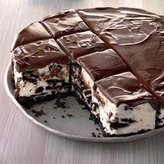 a chocolate and white cake with one slice cut out