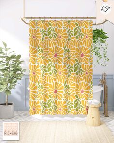 a bathroom with a yellow shower curtain and potted plant