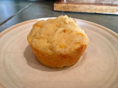 a close up of a muffin on a plate