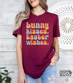 a woman wearing a t - shirt with the words bunny kisses easter wishes on it