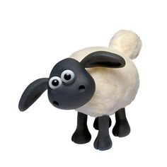 a black and white sheep with big eyes