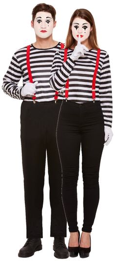 two people with clown makeup on their faces are standing next to each other and one is wearing