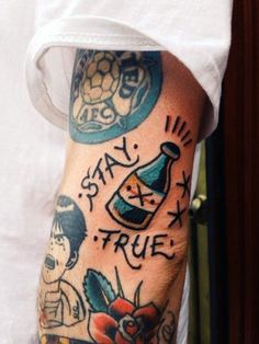 a person with a tattoo on their arm that says stay true