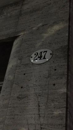 the number twenty four is on the side of a building