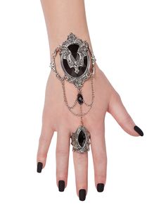 Complete your next vampire costume with this Vampire Bat Hand Chain and you'll be ready to take flight. With this beautiful vampire hand chain on everyone will know you're secretly a vampire at the next spooky Halloween party. Material: Metal Clasp closure Care: Spot clean Imported Vampire Accessories, Vampire Ring, Bat Costume, Spooky Halloween Party, Gothic Vampire, Vampire Costume, Halloween Vampire, Vampire Bat, Gothic Accessories