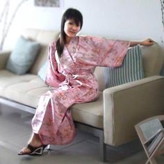 This sexy and elegant pink kimono robe combines the feminine element of pink with the authoritative yang symbol of the dragon for a magnificently unique look. The soft silk fabric of this robe will look and feel great draped around any female.