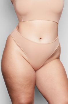 Enjoy the flattering look of cheeky briefs while retaining the breathability of quick-dry fabric with this comfortable option from Kim Kardashian West's SKIMS. Reflecting the brand’s passion for underwear solutions for every body, this style that hits right below the natural waist-available in nine different tones-is destined to be a part of your regular rotation. Style Name:Skims Fits Everybody Cheeky Briefs (Regular & Plus Size). Style Number: 6016427. Available in stores. Seamless Relaxation Brief Bottoms, High Stretch Bra-friendly Shapewear Brief, Seamless Briefs For Relaxation, Supportive Smoothing Brief Swimwear, Supportive Smoothing Swimwear Briefs, Supportive Swimwear With Moderate Coverage, Bra-friendly Stretch Shapewear With High-cut Leg, Bra Friendly Micro-elastic Brief Shapewear, Bra-friendly Micro-elastic Brief Shapewear