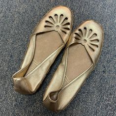 Brand New Flats! Super Comfortable And Never Worn. Casual Gold Open Toe Flats, Casual Gold Synthetic Flats, Casual Gold Slip-on Flats, Gold Slip-ons With Round Toe, Casual Gold Flats With Almond Toe, Gold Spring Slip-ons, Casual Gold Almond Toe Flats, Gold Slip-on Flats With Cushioned Footbed, Gold Leather Slip-ons With Round Toe