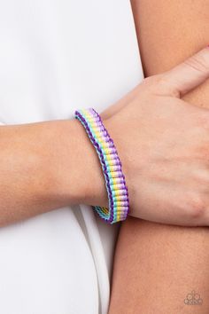 Purple, blue, pink, and yellow thread is decoratively knotted around the wrist, creating a colorful rainbow. Features an adjustable sliding knot closure.

Sold as one individual bracelet. Adjustable Sliding Knot, Accessories Website, Sliding Knot Closure, Slide Bracelet, Rainbow Bracelet, Pink Bubbles, Bracelet Online, Sliding Knot, Paparazzi Accessories