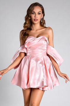 Celebrate in style with the Evelyn Pink Satin Puff Birthday Mini Dress. This playful mini dress features luxurious satin fabric and voluminous puff sleeves, creating a fun and feminine look perfect for birthdays and special occasions. The vibrant pink hue adds a touch of excitement, while the fitted bodice and flared skirt ensure a flattering silhouette. Shine and dazzle as you make unforgettable memories in this eye-catching and chic dress. Handmade customization Fabric composition: 90% polyest Pink Satin Feminine Mini Dress, Pink Feminine Satin Mini Dress, Pink Satin Mini Dress For Night Out, Elegant Pink Mini Dress With Balloon Sleeves, Party Dress With Ruffles And Balloon Sleeves, Pink Feminine Satin Cocktail Dress, Feminine Balloon Sleeve Puff Dress For Party, Feminine Puff Sleeve Mini Dress For Party, Balloon Sleeve Party Dress With Ruffles