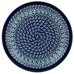 a blue and white plate with an intricate design