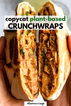 a person holding a sandwich in their hand with the words copycat plant - based crunchwraps