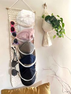 a white wall hanging with various items on it