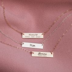 "A Personalized Mama Necklace for the woman who always gives and loves unconditionally. Our Personalized Mama Bar Necklace is the perfect way to show any special mother how much you care! This dainty necklace can be personalized with any mom name, in addition to a special quote or message, date, kids names, and more, making it a truly unique and special gift. Create a one-of-a-kind piece she'll love. A thoughtful and precious keepsake that's sure to become part of Mama's everyday jewelry collection, Give her something truly special that allows her to cherish her babies wherever she goes! Designed with warmth and personal touches in mind - just like the relationship between Mom and her kiddos! Let Mom know how much you care in a unique way that stands out. Melanie Golden Jewelry's Engraved Rose Gold Necklace Hallmarked As Gift For Mom, Personalized Silver Bar Necklace, Personalized Rose Gold Bar Necklace For Gift, Personalized Rose Gold Bar Necklace As Gift, Engraved Bar Necklace For Mother's Day, Engraved Bar Necklace For Mother's Day Personalized Gift, Meaningful Charm Necklaces For Mom As Gift, Rose Gold Charm Necklace With Name For Mom, Rose Gold Name Charm Necklaces For Mom