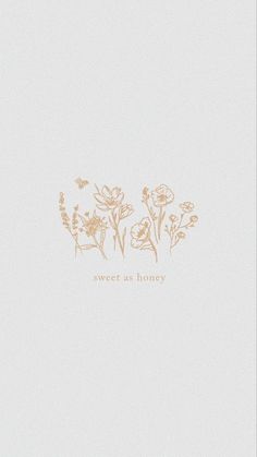 the words sweet as honey are written in gold foil on a white background with flowers