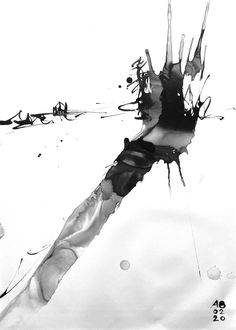 black and white photograph of an abstract object in the air with water droplets on it