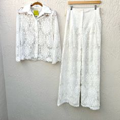 Brand Carol Bassi Made In Brazil Model Matching Lace Set Button Down Shirt And Long Wide Leg Pants Great For Beach Wedding, Bachelorette, White Party Pants Are Lined And Ultra High Waisted. Zipper In Front Material See Label Color Off White Condition Worn 1-2 X Excellent Condition No Flaws Size Both Pieces 38 - Medium Retails For $5.000 Reais - $1.000 Usd Measurements Shirt Pit To Pit 18.5” Shoulder To Shoulder 15” Length 25” Sleeve Length 24” Pants Waist 14.5” Front Rise 16” Inseam Length 34” 5 Star Seller - 5.000 + Items Sold - Fast Shipping - Closets Off Influencers And Fashion Collectors- Shop With Confidence - Smoke-Free Clean Storage Environment - Bundle An Brazil Model, Party Pants, Lace Set, White Party, Shirt And Pants, Leg Pants, Beach Wedding, 5 Star, Wide Leg Pants