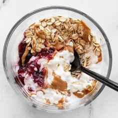 a bowl filled with yogurt and granola