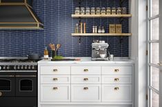 a kitchen with an oven, stove and shelves filled with bottles on the counter top