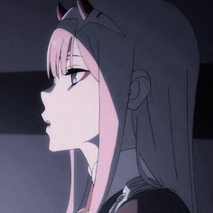 an anime character with pink hair and horns on her head looking off into the distance