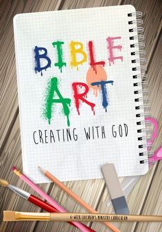 a notebook with the words bible art creating with god on it next to pencils and paintbrushes