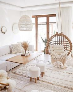 a living room filled with furniture and decor