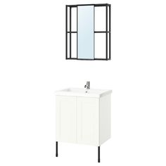 a white sink sitting under a mirror next to a wall mounted cabinet with two mirrors