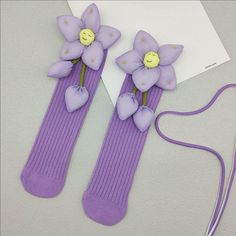 Purple three-dimensional flower kids socks ❤️Cotton fiber is GOTS certified 100% organic cotton. Sock fabric content: 100% cotton. Made in Florida from a small workshop. ❤️These are family socks, suitable for daughters and moms.     SIZE      Kid socks （S）：socks length  11.4in/29cm ,Suitable for children aged 3-8 years old.      Kid socks （M）：socks length  13.4in/34cm,Suitable for children aged 9-13 years old.      Adult socks（Short）：socks length  6.7in/17cm,Suitable for most adult women.      Adult socks（Mid）：socks length 11.8in/30cm,Suitable for most adult women. ❤️This is a sock with detachable three-dimensional flowers, suitable for daughters and mothers to wear when traveling together, and a thoughtful gift. ⭐For more item, please visit our shop at the following link: https://www.etsy Flower Kids, Socks Cotton, Small Workshop, Slipper Socks, Kids Socks, Short Socks, Cotton Socks, Flower Child, Socks And Hosiery