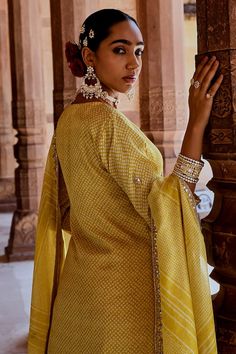 Mustard yellow straight embroidered kurta in muslin base. Paired with muslin pant and embroidered muslin dupatta. - Aza Fashions Yellow Palazzo Set With Printed Motifs In Traditional Drape, Traditional Yellow Palazzo Set With Printed Motifs, Yellow Palazzo Set With Printed Motifs And Traditional Drape, Yellow Chanderi Palazzo Set With Printed Motifs, Yellow Chanderi Sharara With Printed Motifs, Designer Yellow Palazzo Set With Printed Motifs, Yellow Cotton Sharara With Printed Motifs, Yellow Printed Palazzo Set For Diwali, Yellow Chanderi Kurta With Printed Motifs