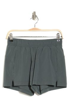 Experience ultimate comfort in these sporty trail shorts designed in a classic mid-rise silhouette. 10" rise, 3" inseam (size S) Elastic waist Pulls on Front slant pockets 88% polyester, 12% spandex Machine wash, tumble dry Imported Model stats: 5'10" height, 32" bust, 25" waist, 36" hip. Model is wearing size S. Athletic Shorts With Built-in Shorts For Hiking, Hiking Activewear With Built-in Shorts, Stretch Athletic Shorts For Hiking, Athleisure Stretch Shorts For Hiking, Stretch Athleisure Shorts For Hiking, Stretch Athletic Shorts For Summer Hiking, Stretch Athletic Shorts For Hiking In Summer, Summer Stretch Athletic Shorts For Hiking, Hiking Athletic Shorts With Built-in Liner