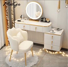 a white chair sitting in front of a vanity with a mirror and lights on it