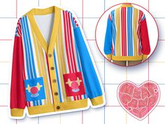 a cardigan sweater with colorful stripes on it and a heart shaped object next to it