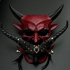 Twisted, coiling horns and corrugated features give this black/red accent various textures that can be appreciated from multiple angles. Perfect for any halloween event. Red Masquerade Mask, Red Masquerade, Masquerade Mask Women, Blender Ideas, Mask Ball, Mens Masquerade Mask, Dnd Campaign, Skull Crafts, Ball Mask