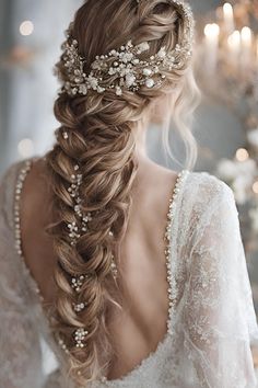 a woman with long hair wearing a wedding dress