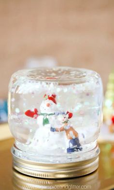 a snow globe sitting on top of a table