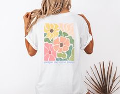 Introducing our Cherish The Little Things T-Shirt, a fun and retro-inspired floral design perfect for soaking up the sun at the beach! This adorable shirt is a must-have for anyone who loves to embrace life's simple pleasures. Made with soft, high-quality fabric, this tee is as comfortable as it is stylish. Whether you're strolling along the shore or lounging by the pool, this retro beach shirt will keep you looking cool and feeling great. Cherish the little things in life with this charming t-s Beach Graphic Tee T-shirt With Print, Retro Screen Print T-shirt For The Beach, Retro Cotton T-shirt For The Beach, Beachy Summer Surfing T-shirt, Playful Graphic Print T-shirt For Beach Season, Ocean Outfits, Summer Ocean, Beachy Style, Retro Beach