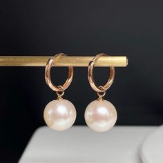 Stand out in these exquisite Freshwater Pearl & Classic Hoops Earrings. House of Pearls-JT crafted this perfect combination of 11-12mm Freshwater Pearl & Good Hoops Earrings and classic hoops for an elegant addition to your look. These earrings will be sure to bring that special sparkle to any outfit. Whether you're dressing up for an evening out or a casual day, these earrings are the perfect accessory for any occasion. Add this timeless piece to your collection and discover just how stunning i Rose Gold Sterling Silver Round Pearl Earrings, Hypoallergenic Rose Gold Round Pearl Earrings, Classic Rose Gold Hypoallergenic Pearl Earrings, Classic Hypoallergenic Rose Gold Pearl Earrings, Classic Round High Luster Earrings, Luxury Hoop Earrings With Pearl Drop, Luxury Hoop Pearl Earrings For Formal Occasions, Luxury Pearl Hoop Earrings For Formal Occasions, Luxury Formal Hoop Pearl Earrings